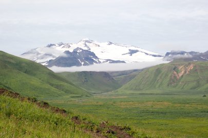 Growing up in Unalaska, on clear days we see the light steam rising from the top of Makushin Volcano.