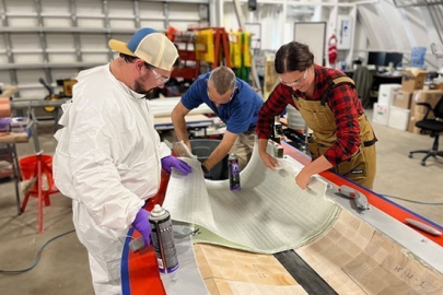 Three researchers are working on tools