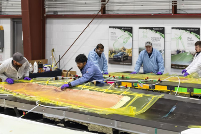 ORNL researchers and technicians prepare to remove the wind blade tips