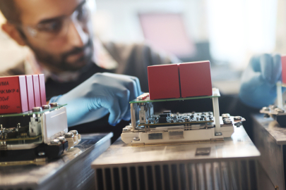 Scientist conducting marine power electronics research.