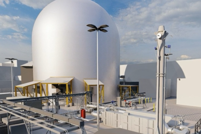 Idaho National Laboratory's DOME facility, a silver dome-like structure against a cloudy sky.