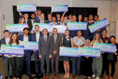 EnergyTech Univeristy Prize 2025 National Winners holding checks with DOE Chief Commercialization Officer and Office of Technology IOTC) Commercialization Director Anthony Pugliese and OTC Chief of Staff Justin Bis.