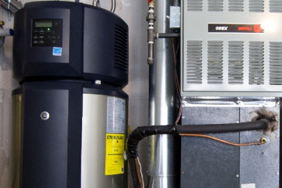 The mechanical area of a home, showing the water heater and other equipment.