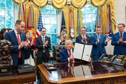 President Trump signing executive orders.
