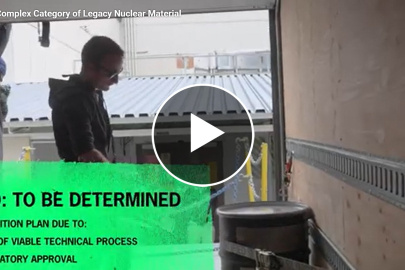 A thumbnail of a YouTube video showing employees working with nuclear materials at SRNl