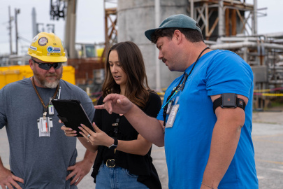 Employees wearing protective gear outdoors at the Savannah River Site