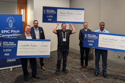 EPIC pitch Competition Winners holding checks at TechConnect World 