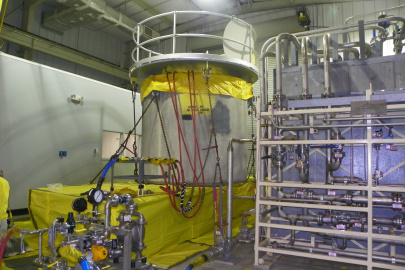 A yellow machine with pipes around it at the Savannah River Site