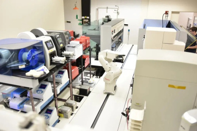 The iBioFAB biofoundry at the Carl R. Woese Institute for Genomic Biology (IGB) at Illinois. 