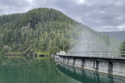 A hydropower facility in front of a mountain