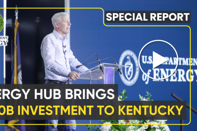 YouTube video thumbnail featuring the DOE Secretary standing behind a podium on a stage