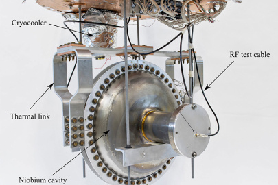 A superconducting radio-frequency (RF) accelerator cavity is mounted and connected to a cryocooler, cooling the cavity without the use of liquid helium. This new device could make it easier to produce high-average-power electron beams for industrial applications.