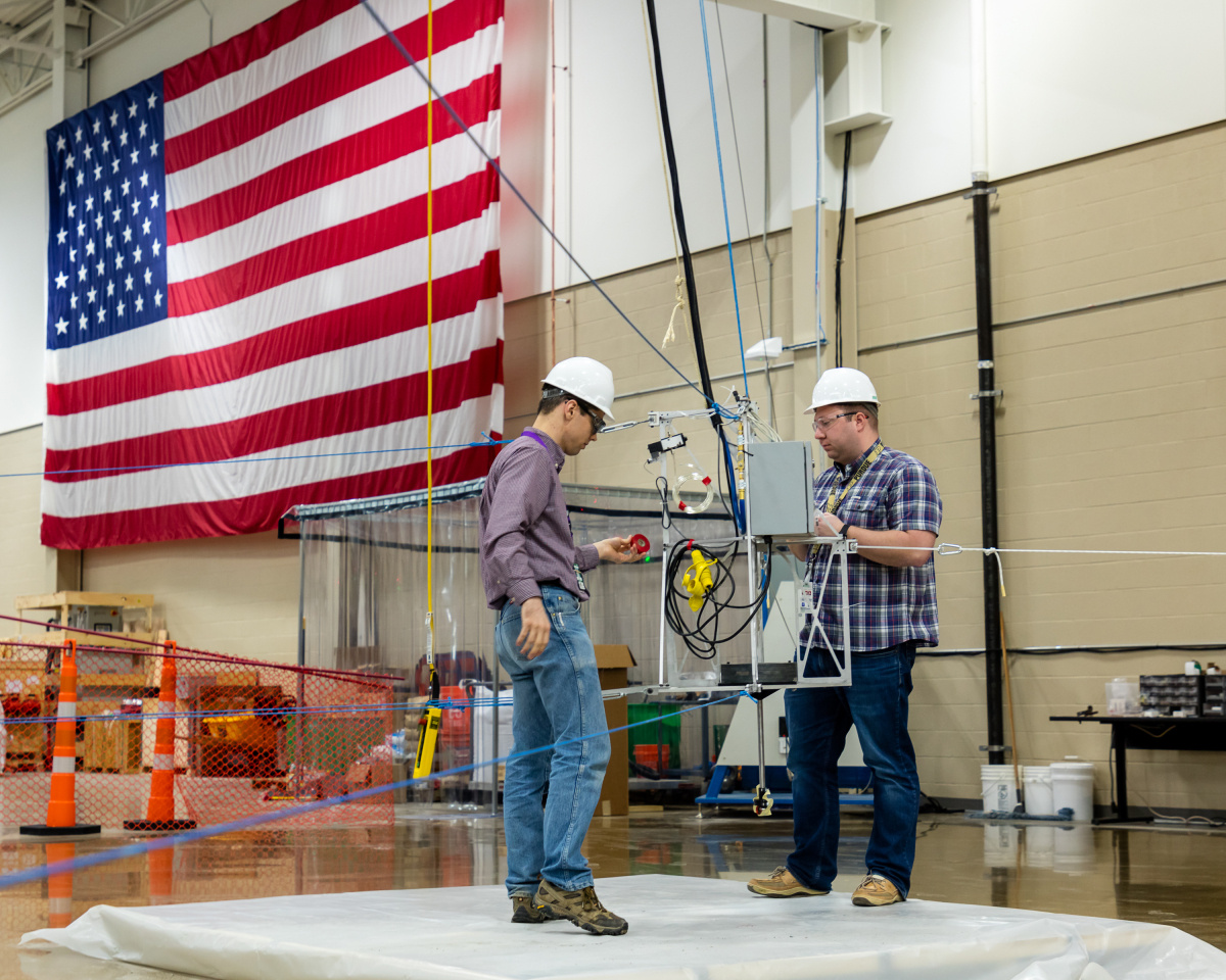 Brian Post, a large-scale additive manufacturing research at ORNL, designed SkyBAAM, a low-cost, cable-driven field deployable additive manufacturing system that uses low embodied carbon concrete. 