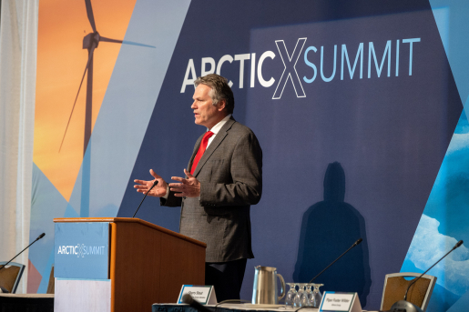 A speaker at the ArcticX Summit.