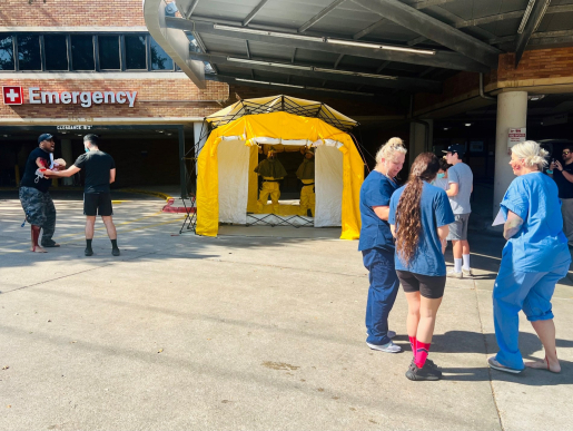 An Austin-area hospital receives simulated patients from the “dirty bomb explosion simulated in the Cobalt Magnet exercise. 