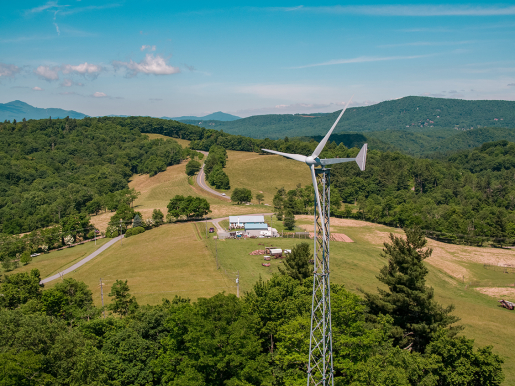 Aerial view of distributed wind and the mountains. 