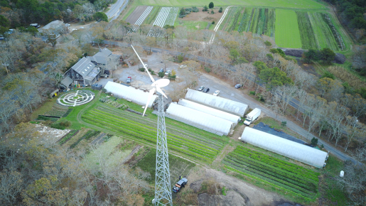 Aerial view of a E3120 at a small farm. 