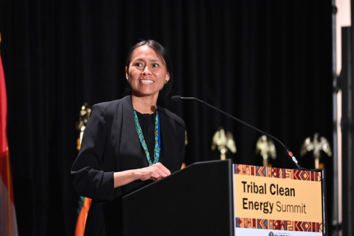 Office of Indian Energy director Wahleah Johns at podium.