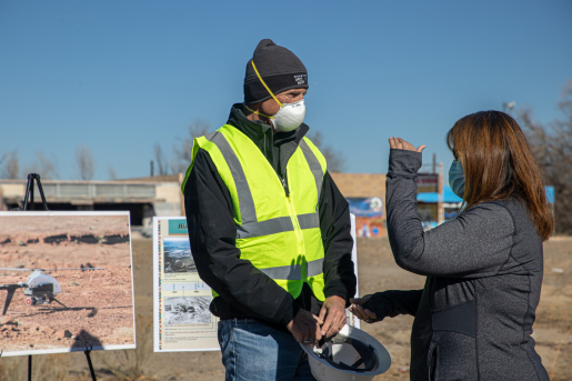 The Shiprock Site manager discusses the flights with an interested Shiprock, New Mexico community member, January 2022