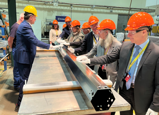 Administrator Hruby and a group examine the Westinghouse-produced VVER-440 shroud at the Swedish facility.