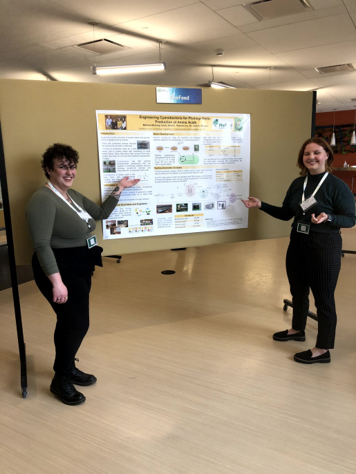 Team PheFeed displaying their Poster.
