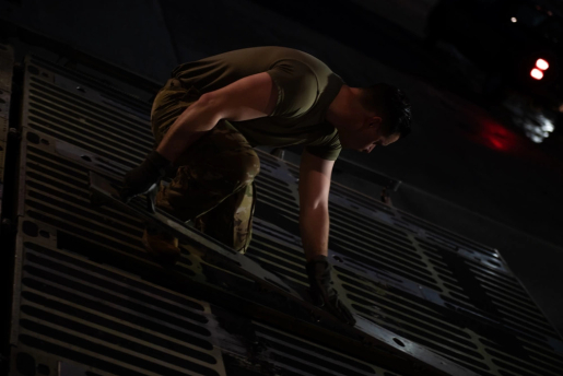 U.S. Air Force Staff Sgt. Luke Mitchell, a 437th Aerial Port Squadron ramp services technician, reconfigures the floor of a C-5 Super Galaxy to properly onload critical equipment at Joint Base Charleston, South Carolina, Jan. 31, 2023. The U.S. Air Force partnered with the U.S. Department of Energy to deliver critical equipment to Ukraine, to bolster the nation’s energy infrastructure.