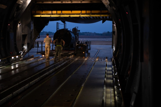 U.S. Airmen assigned to the 437th Aerial Port Squadron, load critical infrastructure equipment onto a C-5 Super Galaxy at Joint Base Charleston, South Carolina, Jan. 31, 2023. The U.S. Air Force partnered with the U.S. Department of Energy to deliver critical equipment to Ukraine, to bolster the nation’s energy infrastructure.