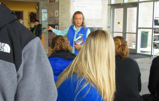 Students learning about the engineering process for the on-site disposal cell as part of a STEM program. 