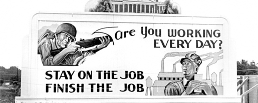 Black and white photo of an old billboard.