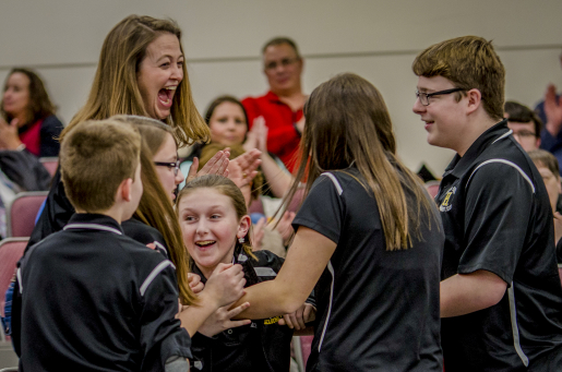 Students celebrating in a group.
