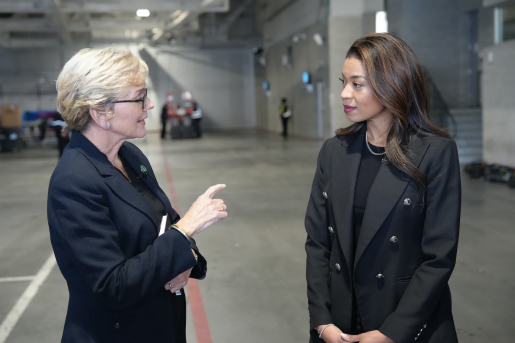 U.S. Secretary of Energy Jennifer Granholm speaks with President of the Las Vegas Raiders Sandra Douglass Morgan at Allegiant Stadium in Las Vegas on February 1, 2024.