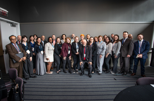 A large group of people posing for the camera.