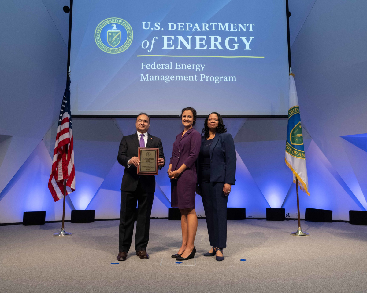 A group of people posing for a photo at the 2024 Federal Energy and Water Management Awards ceremony.