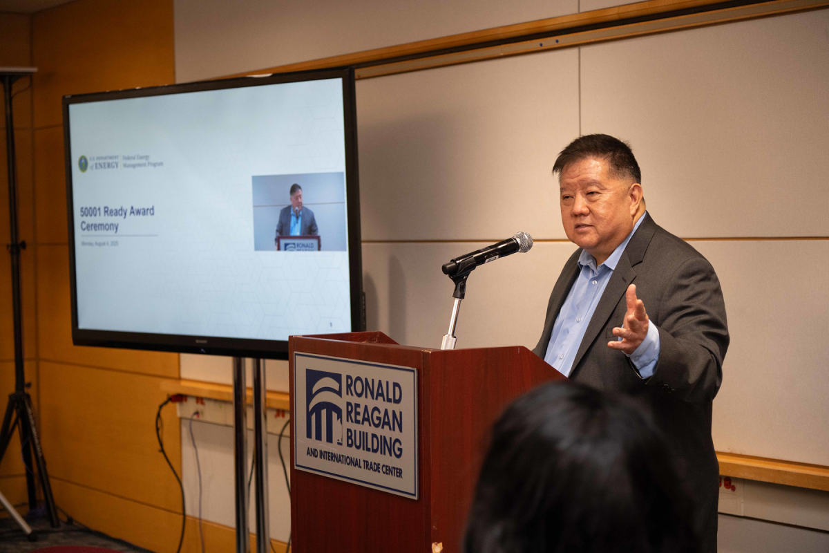 Man speaks at podium at 50001 Ready Award Ceremony
