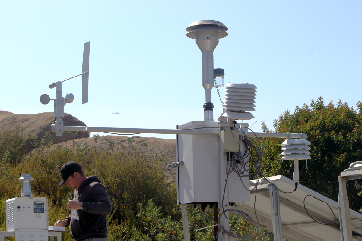 Changing air monitor filters during Sandy Fire