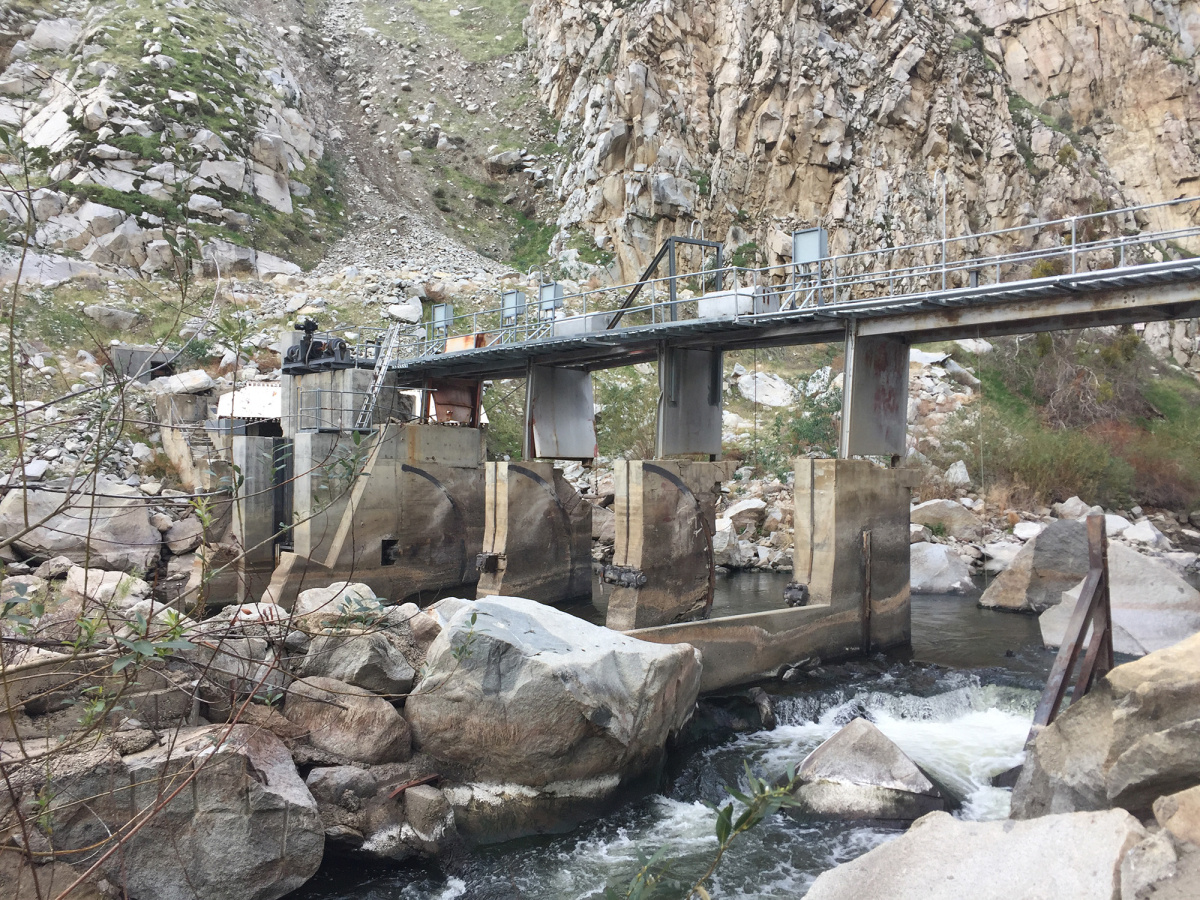 Damage to the dam's intake structure following the 2017 rockslide. 