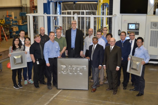AMO Director Mark Johnson (center) helps commission the RAFFT machine in Rockford, Illinois. Photo courtesy of Ingersoll Rand. RAFFT Machine