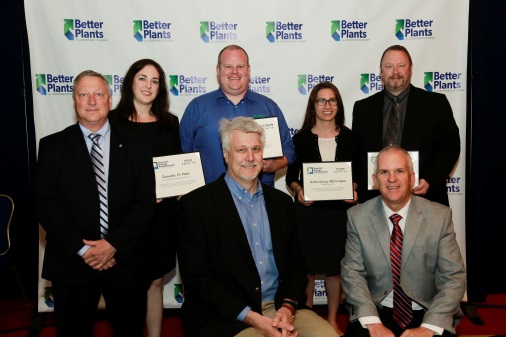 DOE’s Mark Johnson and Paul Scheihing pose with representatives from SEP-certified plants from Schneider Electric, Volvo, MedImmune and Coca-Cola. DOE’s Mark Johnson and Paul Scheihing pose with representatives from SEP-certified plants from Schneider Electric, Volvo, MedImm