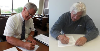 Representatives from the Des Moines Metropolitan WRA and Des Moines Water Works sign the SEP agreement. Photo of WRA and Des Moines Water Works representatives signing onto the pilot program.