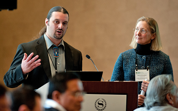 Travis Stone, Shoshone Bannock Tribe, and Rebecca Kauffman, Southern Ute Alternative Energy Investment Fund, speaking at the Office of Indian Energy Tribal Leader Energy Forum on transmission. Photo by Dennis Schroeder, NREL Image of a speaker at the forum.