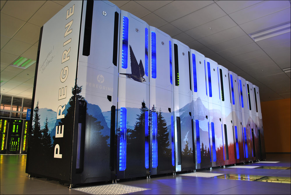 Photo of a high-tech data center shows a long tall bank on servers.
