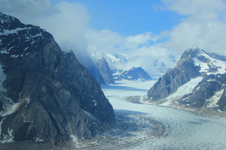 Ice Formed by Contact Freezing: Pressure Matters, Not Just Temperature