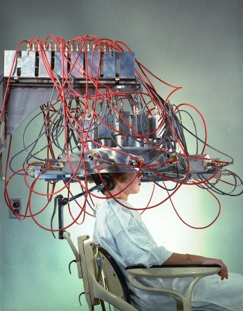 In 1961, chemists at Brookhaven National Laboratory studied how to detect small brain tumors by analyzing the decay of radioactive material injected into the patient's bloodstream and absorbed by the tumor. To help them, BNL's Instrumentation Division built different arrays of detectors, and this circular type proved best. In the 1970s, BNL helped reconstruct the raw data received by the detectors into an image of the working brain. This breakthrough led to more practical devices for imaging areas of the brain: today's Positron Emission Tomography (PET) machines. BNL scientists have used PET technology to study major areas of medical research including drug and alcohol addiction, obesity and eating disorders, attention deficit hyperactivity disorder (ADHD), aging, and neurodegenerative disorders. | Photo courtesy of Brookhaven National Laboratory. In 1961, chemists at Brookhaven National Laboratory studied how to detect small brain tumors by analyzing the decay of radioactive material injected into the patient's bloodstream and absorbed by the tumor. To help them, BNL's Instrumentation Division built different arrays of detectors, and this circular type proved best. In the 1970s, BNL helped reconstruct the raw data received by the detectors into an image of the working brain. This breakthrough led to more practical devices for imaging areas of the brain: today's Positron Emission Tomography (PET) machines. BNL scientists have used PET technology to study major areas of medical research including drug and alcohol addiction, obesity and eating disorders, attention deficit hyperactivity disorder (ADHD), aging, and neurodegenerative disorders. | Photo courtesy of Brookhaven National Laboratory.