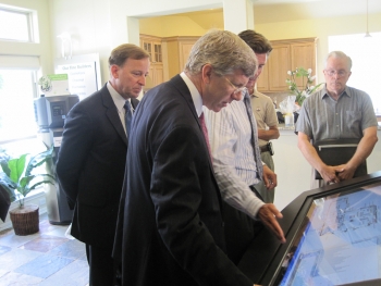 Deputy Secretary Daniel Poneman sees firsthand how new in-home monitors help consumers save money. <a href = "http://energy.gov/photos/how-smart-grid-helps-homeowners-reduce-their-energy-use">Click here to see more photos</a> and learn how new smart grid technology can help you save. | Energy Department Image | Photo by Jen Stutsman Deputy Secretary Daniel Poneman sees firsthand how new in-home monitors help consumers save money. <a href = "http://energy.gov/photos/how-smart-grid-helps-homeowners-reduce-their-energy-use">Click here to see more photos</a> and learn how new smart grid technology can help you save. | Energy Department Image | Photo by Jen Stutsman