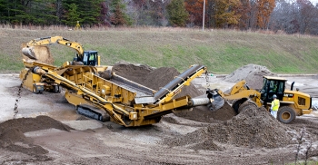 The 516-T, nicknamed the âspider,â included multiple conveyor belts carrying soil through a series of screens to sift bullet debris from the soil of the former outdoor firing range on the EM reservation. The 516-T, nicknamed the âspider,â included multiple conveyor belts carrying soil through a series of screens to sift bullet debris from the soil of the former outdoor firing range on the EM reservation.