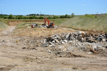 Crews work to finalize the demolition and soil cleanup of the X-114A Outdoor Firing Range Crews work to finalize the demolition and soil cleanup of the X-114A Outdoor Firing Range