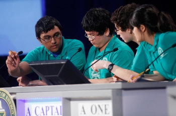 Zaroug Jafeel, Mathew Arbesfeld, Julia Leung, and Alan Zhou from the Lexington High School team concentrate to answer question in the final match of the National Science Bowl April 30. The Lexington team won first place in the high school competition. | Photo by Dennis Brack, Energy Department Office of Science Zaroug Jafeel, Mathew Arbesfeld, Julia Leung, and Alan Zhou from the Lexington High School team concentrate to answer question in the final match of the National Science Bowl April 30. The Lexington team won first place in the high school competition. | Photo by Dennis Brack, Energy Department Office of Science