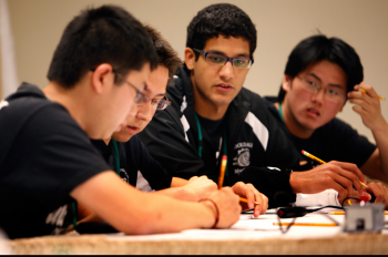 Members of the Los Alamos High School team, Los Alamos, New Mexico, concentrates on the answer to a question at the 2012 National Science Bowl in Washington D.C. on April 29, 2012. | Photograph by Dennis Brack, Office of Science Members of the Los Alamos High School team, Los Alamos, New Mexico, concentrates on the answer to a question at the 2012 National Science Bowl in Washington D.C. on April 29, 2012. | Photograph by Dennis Brack, Office of Science