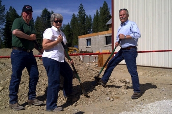 Dale and Sharon Borgford, small business owners in Stevens County, WA, break ground with Peter Goldmark, Washington State Commissioner of Public Lands. The pair brought more than 75 jobs to the area with help from DOE's State Energy Program and the U.S. Forest Service. | Photo courtesy of Washington DNR. Dale and Sharon Borgford, small business owners in Stevens County, WA, break ground with Peter Goldmark, Washington State Commissioner of Public Lands. The pair brought more than 75 jobs to the area with help from DOE's State Energy Program and the U.S. Forest Service. | Photo courtesy of Washington DNR.
