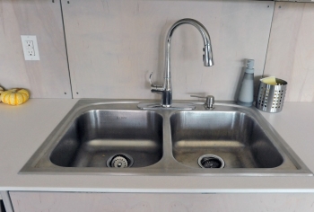 Fix leaky faucets to save $35 and 1,661 gallons of water. | Photo courtesy of Thomas Kelsey/U.S. Department of Energy Solar Decathlon Fix leaky faucets to save $35 and 1,661 gallons of water. | Photo courtesy of Thomas Kelsey/U.S. Department of Energy Solar Decathlon